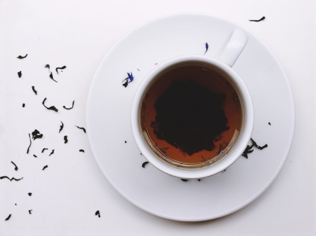 Kali chai patti black tea leaves cup — chai patti natural hair care remedy