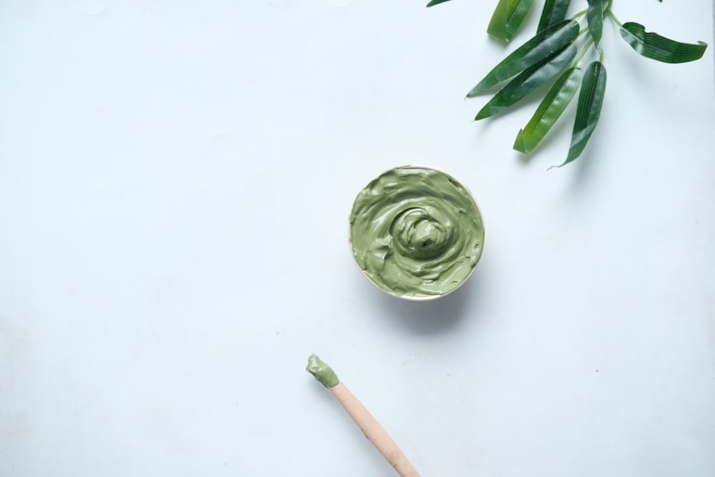 Henna mehndi paste green bowl with applicator brush — step by step hair application