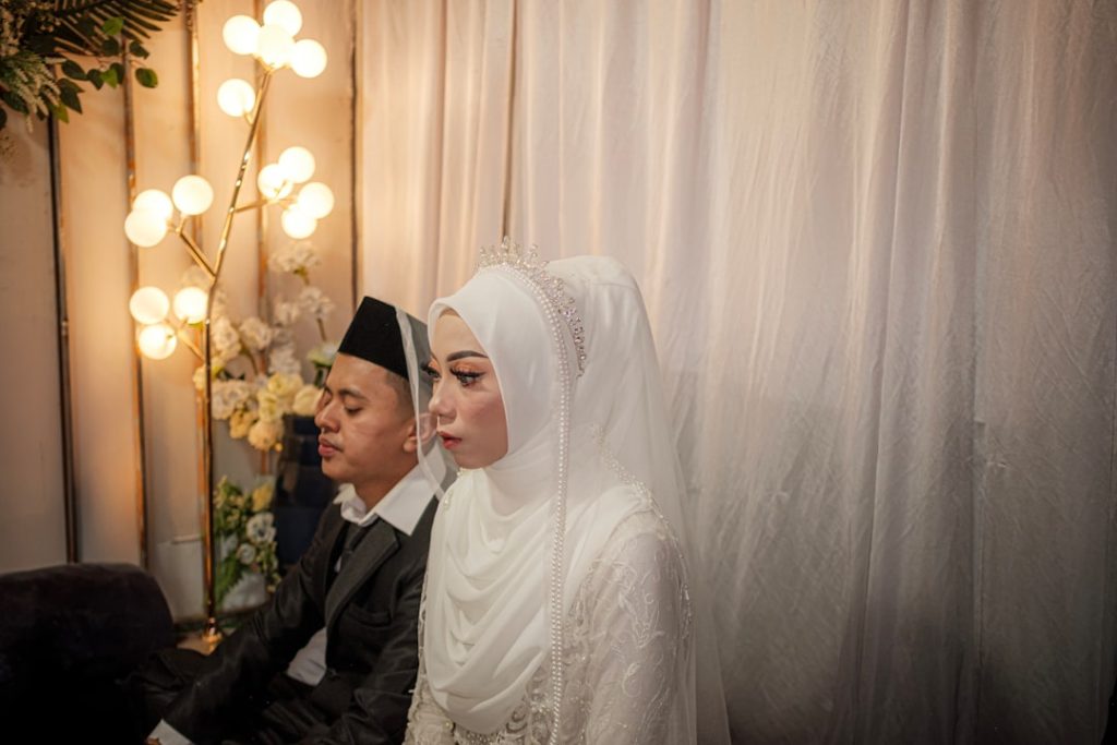 Muslim bride in hijab and groom at a nikah ceremony, representing serious Islamic marriage proposals in Faisalabad